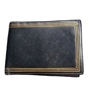 Black leather wallet gold embossed, folded classy.
